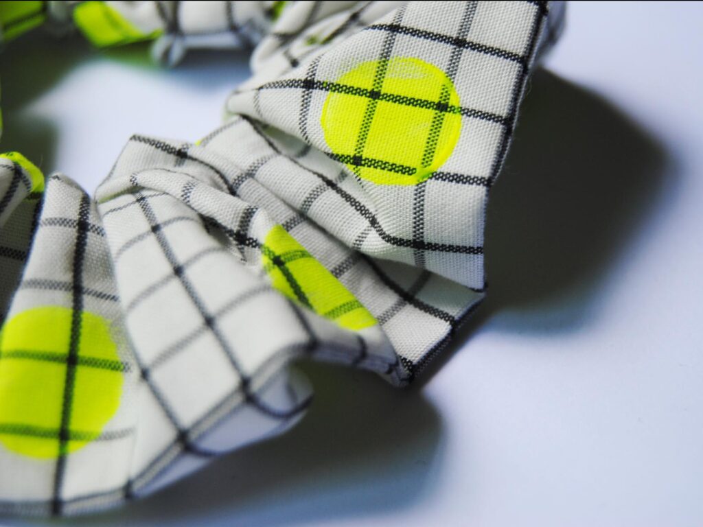 Detalle-coletero-topo-amarillo